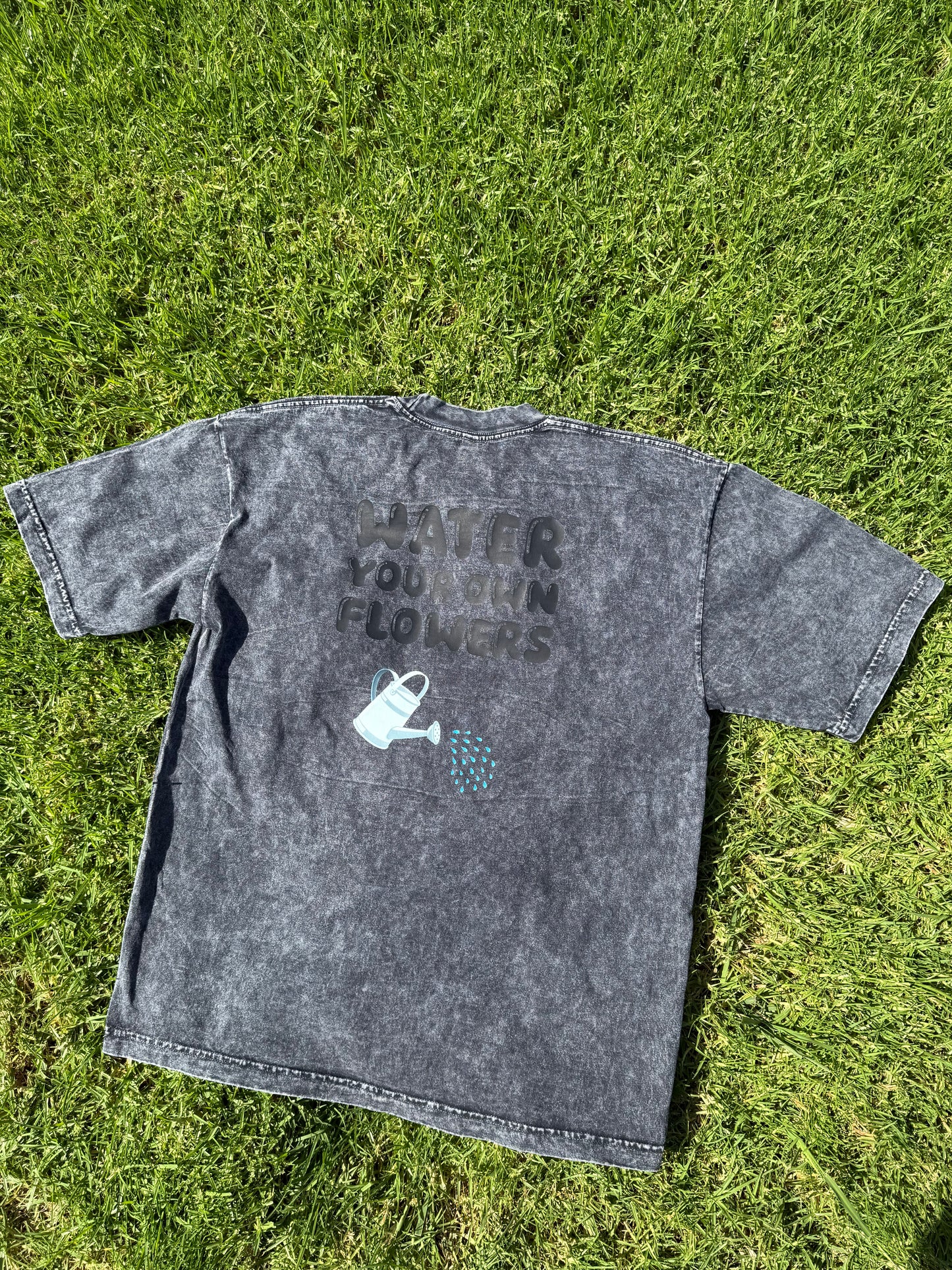 Acid black “WATER YOUR OWN FLOWERS” T-shirt